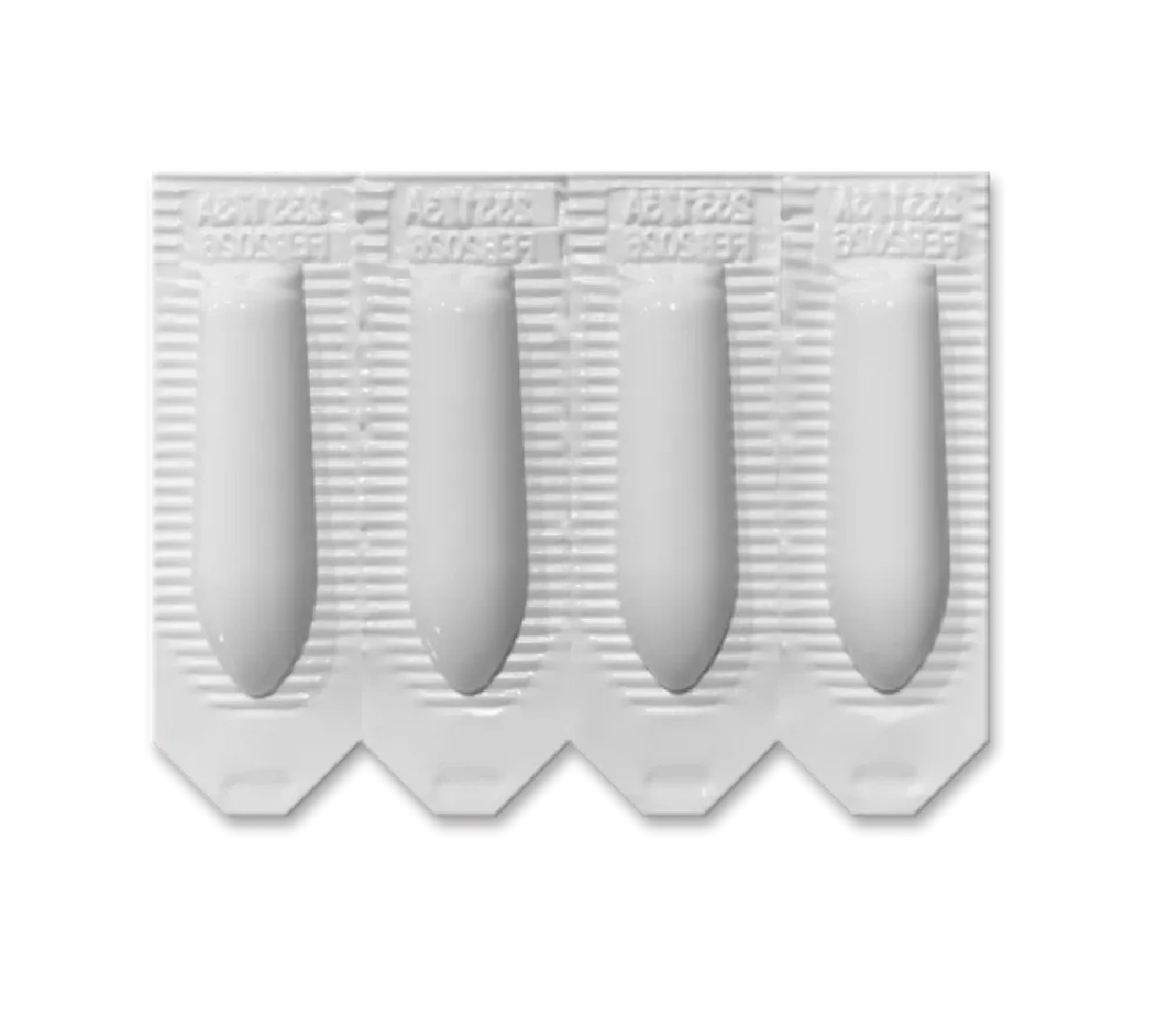 Blister pack containing five white suppositories.