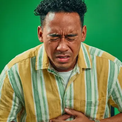 a man suffering from an occasional constipation